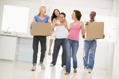 Professional packers preparing household items in St Johns