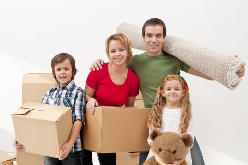 Furniture and boxes being loaded into a removals van