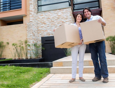 Professional removals team handling packing and loading
